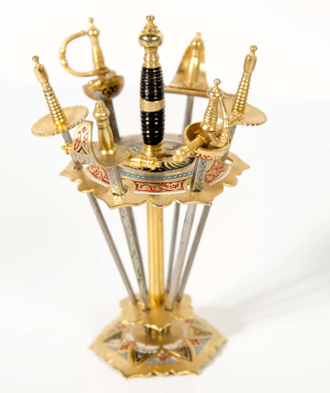 This gorgeous set features fine inlaid enamel work set in gilt brass detailing.
