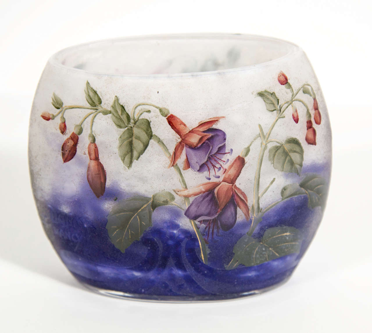 Art Nouveau double-overlaid and acid etched glass vase adorned with Fuchsia Magellanica blossoms signed by the prestigious Nancy Daum. Works by Daum, especially of such superior craftsmanship, are highly collectible and increasingly scarce. Cameo