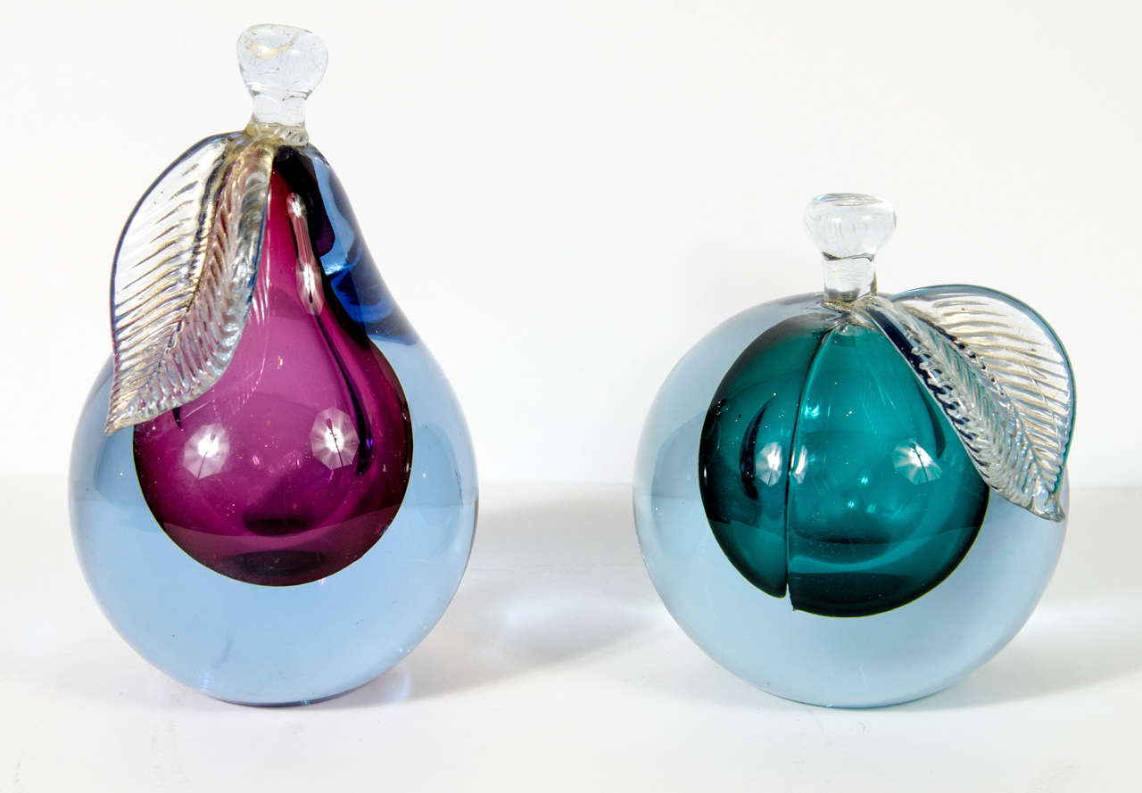 Teal, Magenta and Clear Hand Blown Murano Glass Pear and apple with 24k Gold flecks on the stem and leaves. Stunning decorative pieces with a solid weight and beautiful clarity. 
Pear Measurement: 7.5