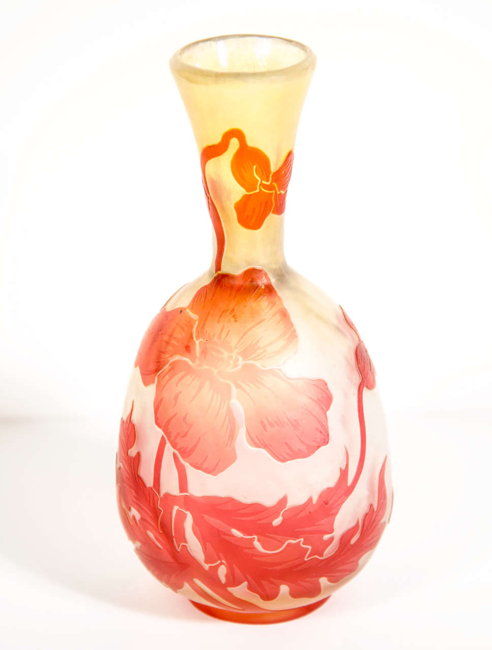 Art Nouveau double-overlaid and etched glass vase adorned with vermilion hibiscus blossoms and leaves signed by the prestigious Devez. Works by Devez, especially of such superior craftsmanship, are highly collectible and increasingly scarce. Cameo