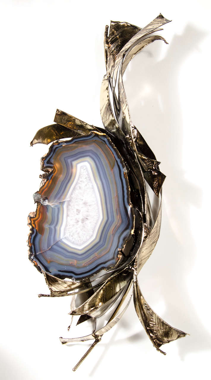 Mid-Century Modernist one of a kind, exquisite jewel like wall sculpture in patinated bronze that is surrounding a stunning specimen of sliced cerulean blue crystal geode in an brutalist free-form manner hand signed by Marc D'Haenens.