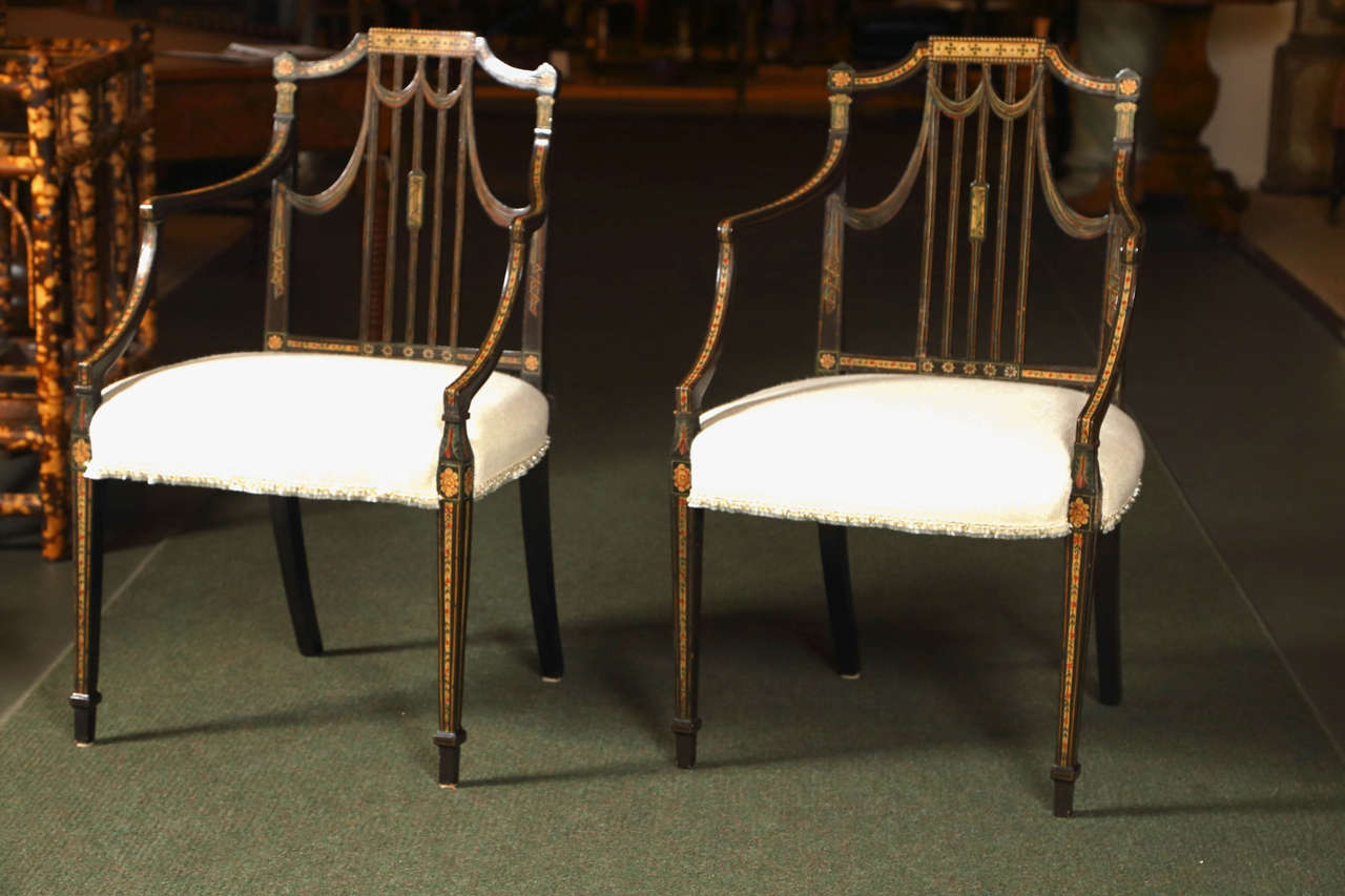 A beautifully painted pair of George III armchairs in the manner of Gillows. 
Provenance: Kentshire  Galleries.