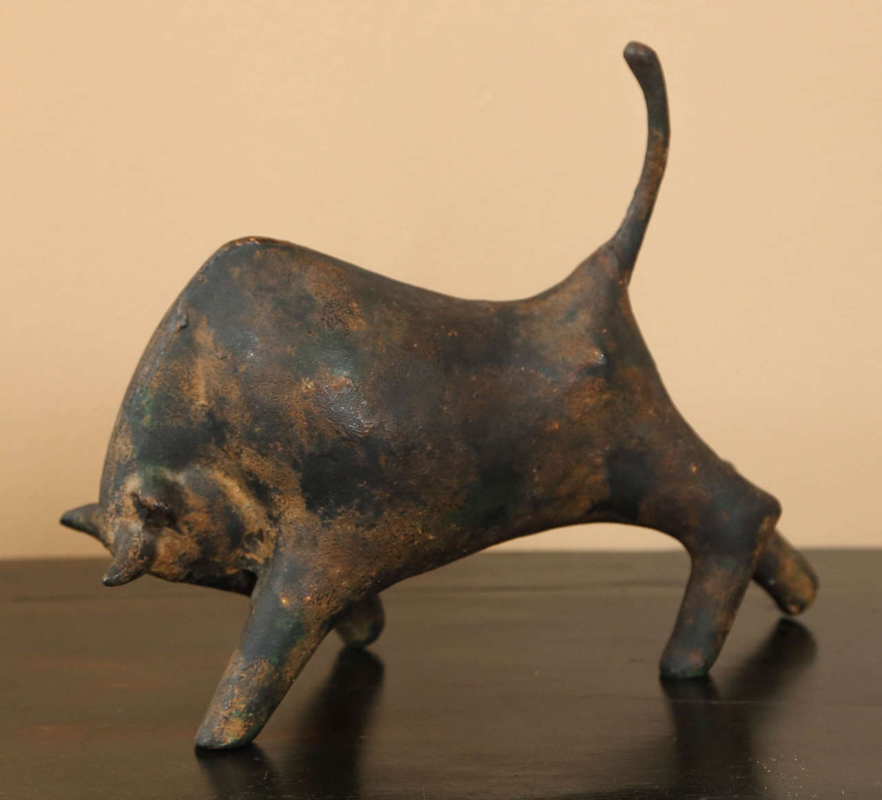 Reminiscent of A. Di Modica's 1989 version located at the corner of Broadway and Wall street, NY, this expressive version of the charging  bull appears to be unsigned. Beautiful original patina.