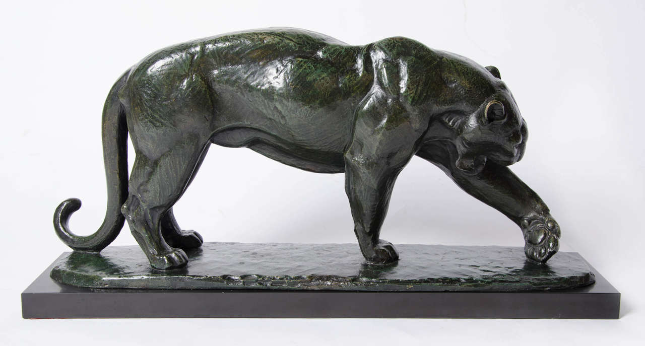 Panthere, an Art Deco bronze study of a panther washing itself by André Vincent Becquerel (1893-1981). Stunning rich green-brown patina, set onto a naturalistic integral plinth.

French, circa 1925, signed A. Becquerel, H33cm, L 68.5cm