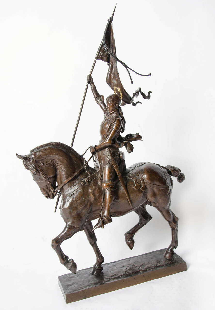 Jeanne d'Arc by Emmanuel Fremiet (1824-1910). A stunning early salon version of the famous Joan of Arc in the Place des Pyramides in Paris. Wonderful rich brown patina and stunning hand chased detail and characterisation. This piece is in exemplary