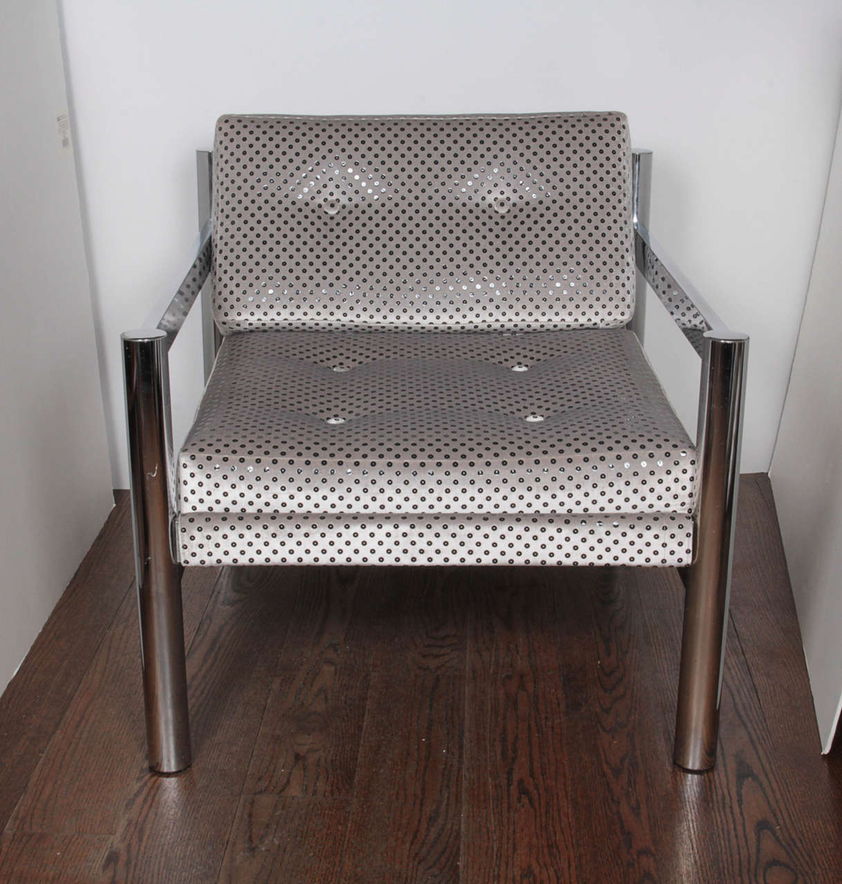 A 70's chrome tubular chair newly upholstered in a sexy silvery-grey Stark 
