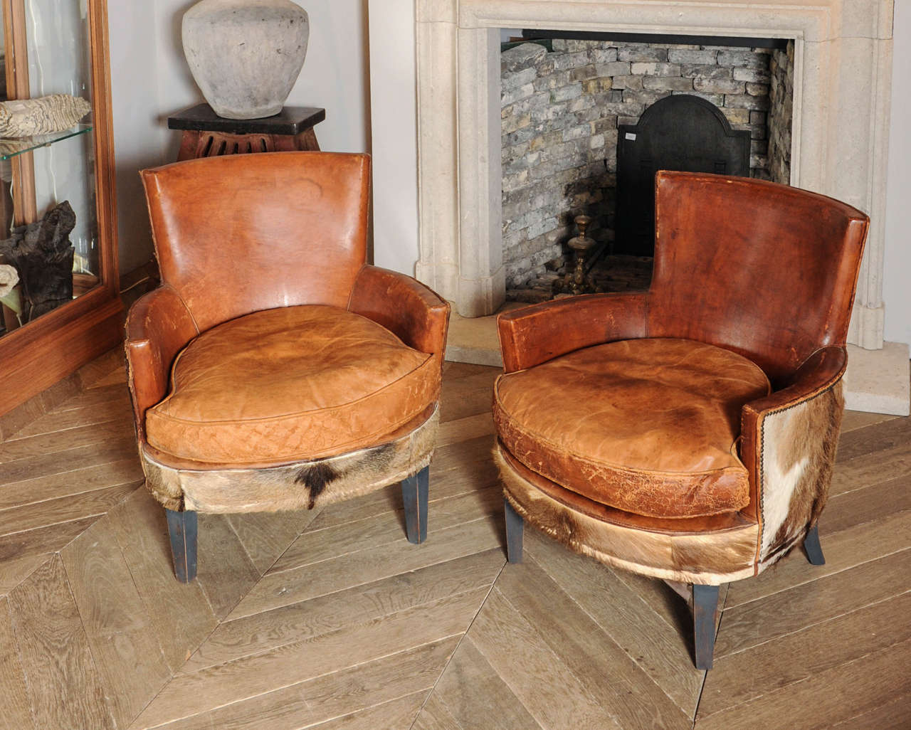A pair of 1910s-1920s boar skin armchairs.