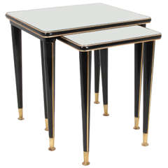 French Modern nesting tables with bronze trim and sabots