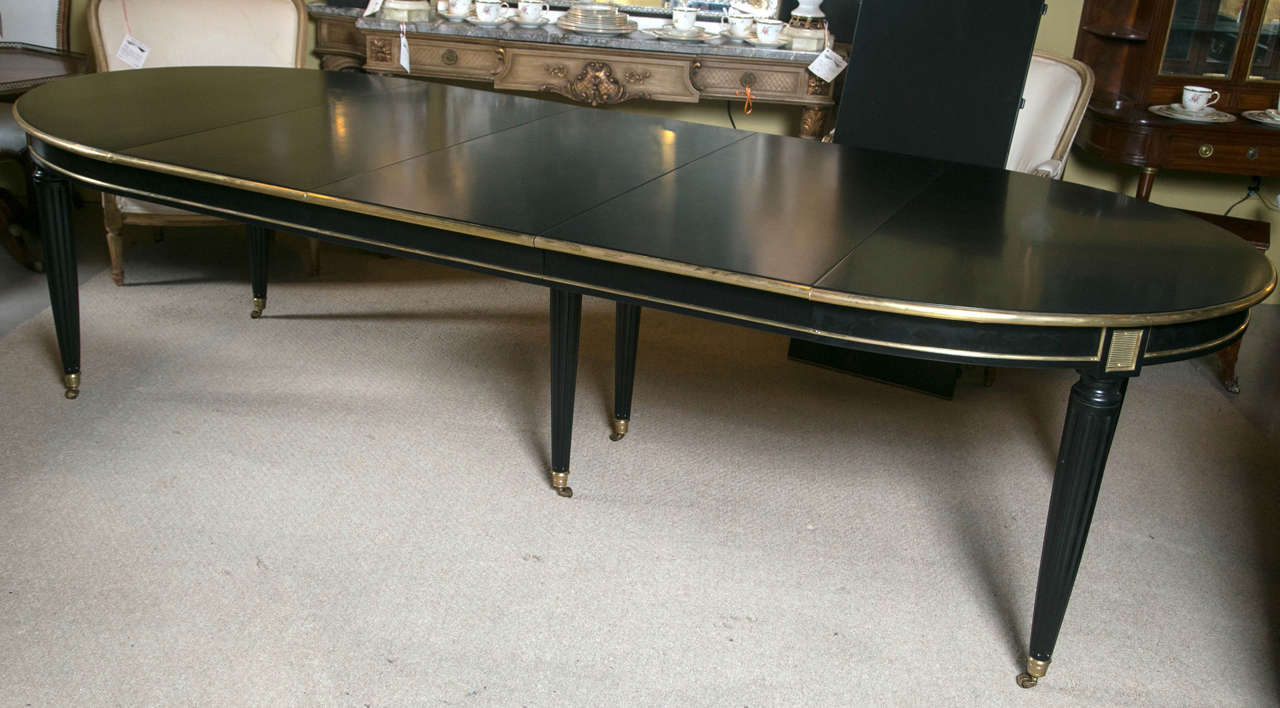 Mid-20th Century French Louis XVI Style Ebonized Jansen Four-Leaf Dining Table