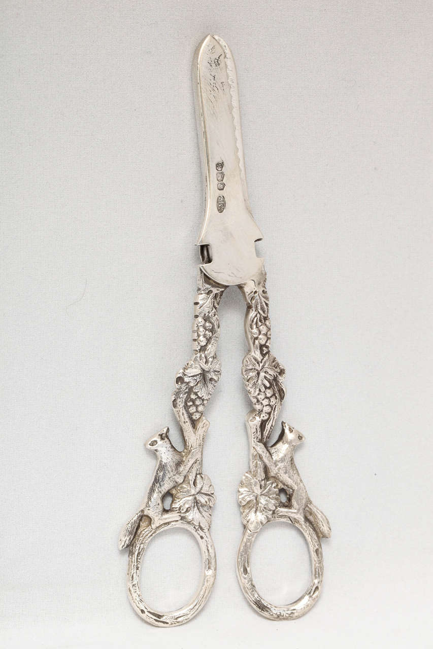 Pair of sterling silver, Victorian style grape shears, Sheffield, England, 1938. 