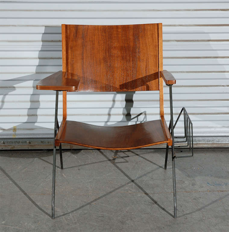 Pierre Guariche iron feet and walnut seat chair with attached magazine rack
