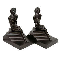 Nuart Pair of Bookends. Nude Sitting on Steps.