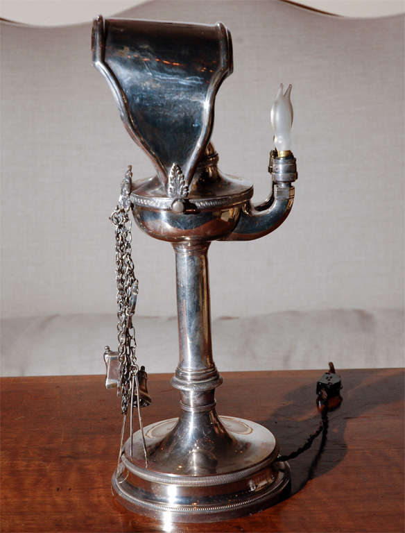 Italian, silver plated, gas lamp with adjustable reflector, hand-cast face detail and wick trimming accouterment.