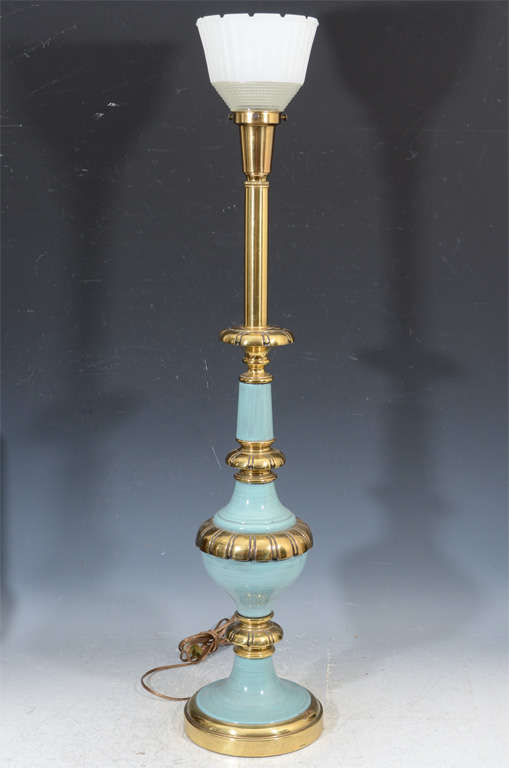 A pair of vintage brass lamps by Stiffel with pale blue enameled bodies and white glass shades.

Reduced from $975.00