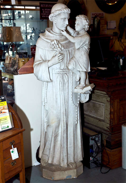 Antique Life size Italian Marble St. Anthony Statue with child.  This St. Anthony statue is carved out of one solid piece of marble. (not cast).  This statue dates back to early 1900's, and has great traditional detail and carving.  St. Anthony is