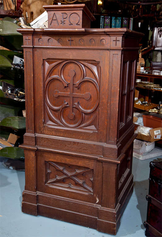 Beautiful antique pulpit / podium for presentation in a church, congregation or community group.  It has sturdy steps for getting into pulpit. It is inscribed with  symbols Alpha, Chi-Rho, and Omega, Alpha and Omega are the first and last letters of