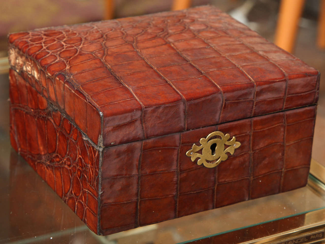 A wonderful vintage British jewelry box covered in alligator eith velvet fitted interior