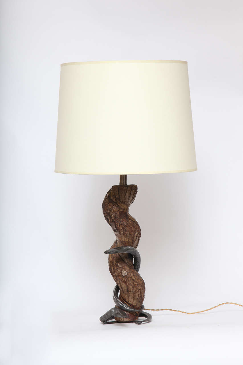 Table lamp sculptural snake wood and wrought iron, France, 1940s
New sockets and rewired
Shade not included.