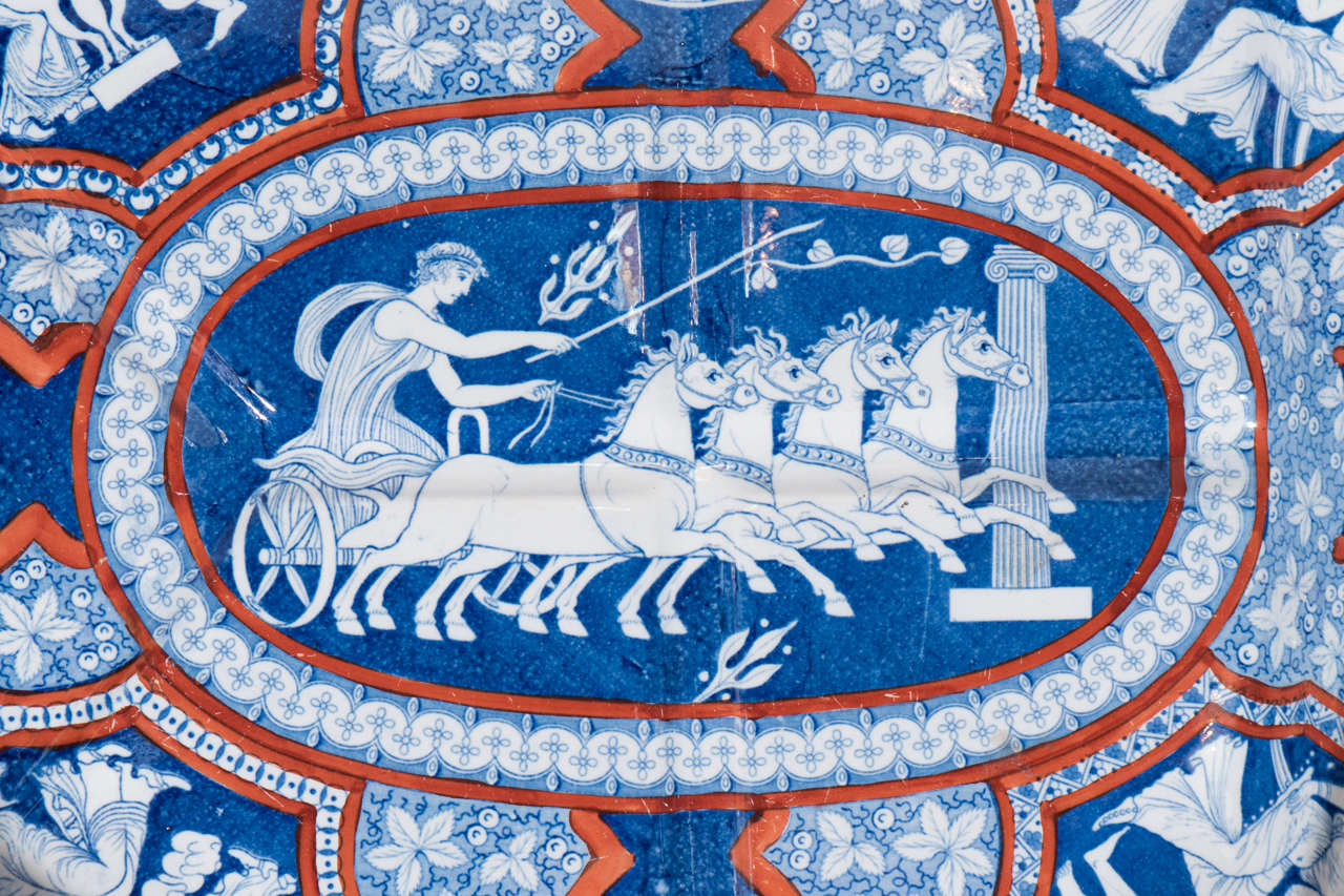 A large Spode clobbered meat platter printed in the Greek pattern in red, white and blue. Based on ancient Greek and Roman art with classical figures the designs for this pattern were taken in 1804 from the collection of Sir William Hamilton.