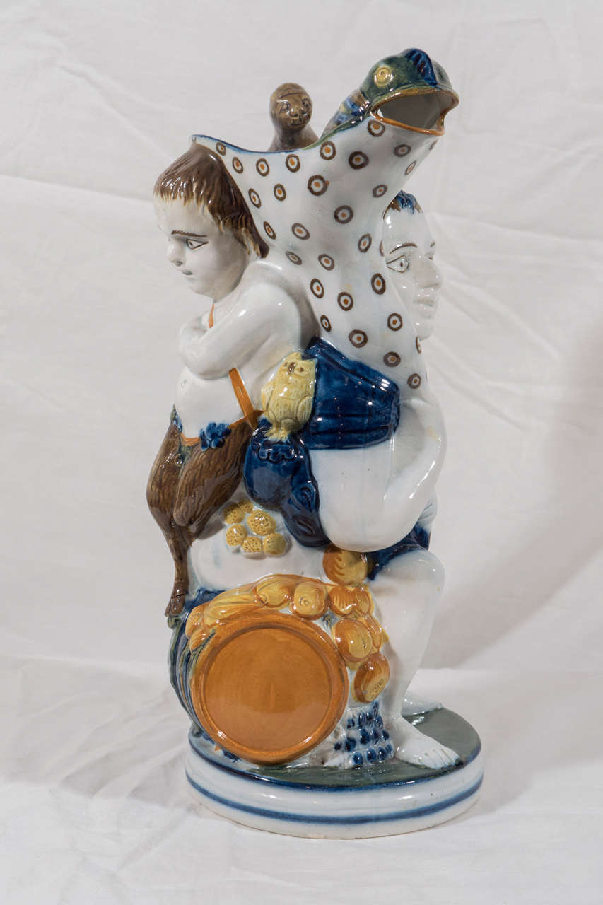 Earthenware An Early 19th Century Bacchus and Pan Staffordshire Pottery Toby Jug