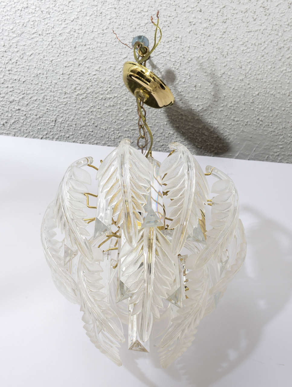Suitable for a Bathroom or Hallway this small Lucite Chandelier is fitted with four lights. Three on the side and one Center. All Lucite Part are Removable.