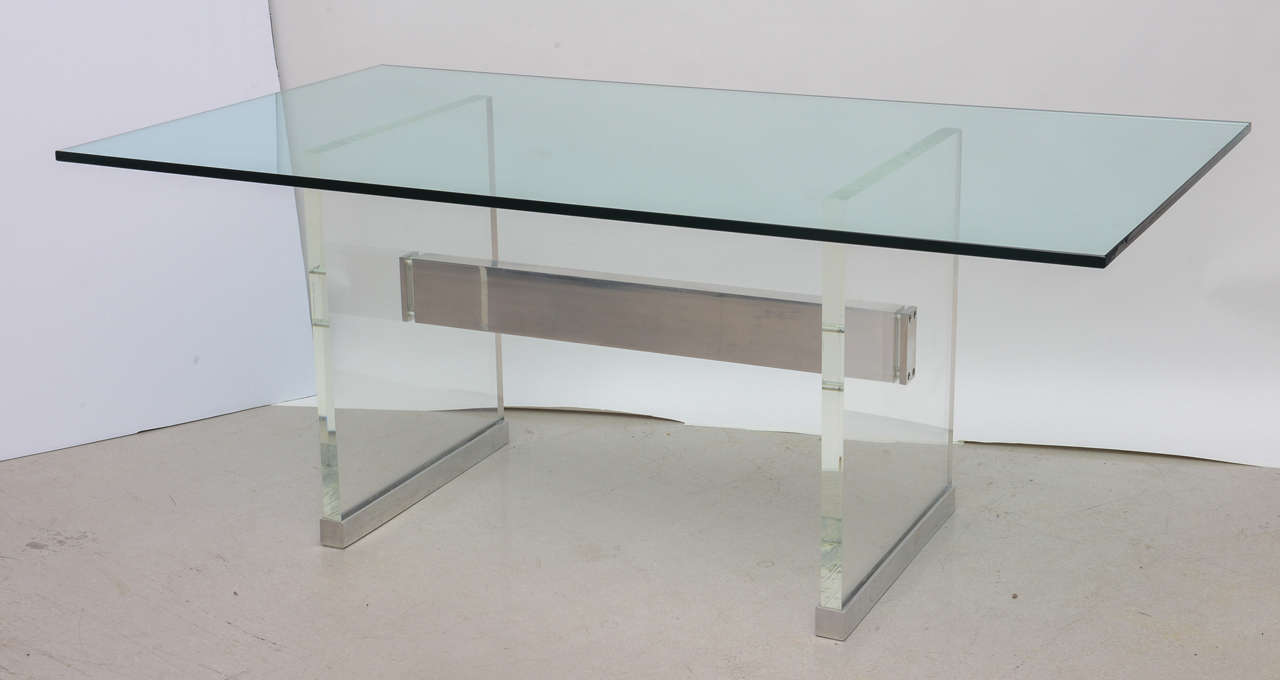 Vintage geometric Lucite and aluminum table which can be used as a desk or a table. The glass top is 1/2