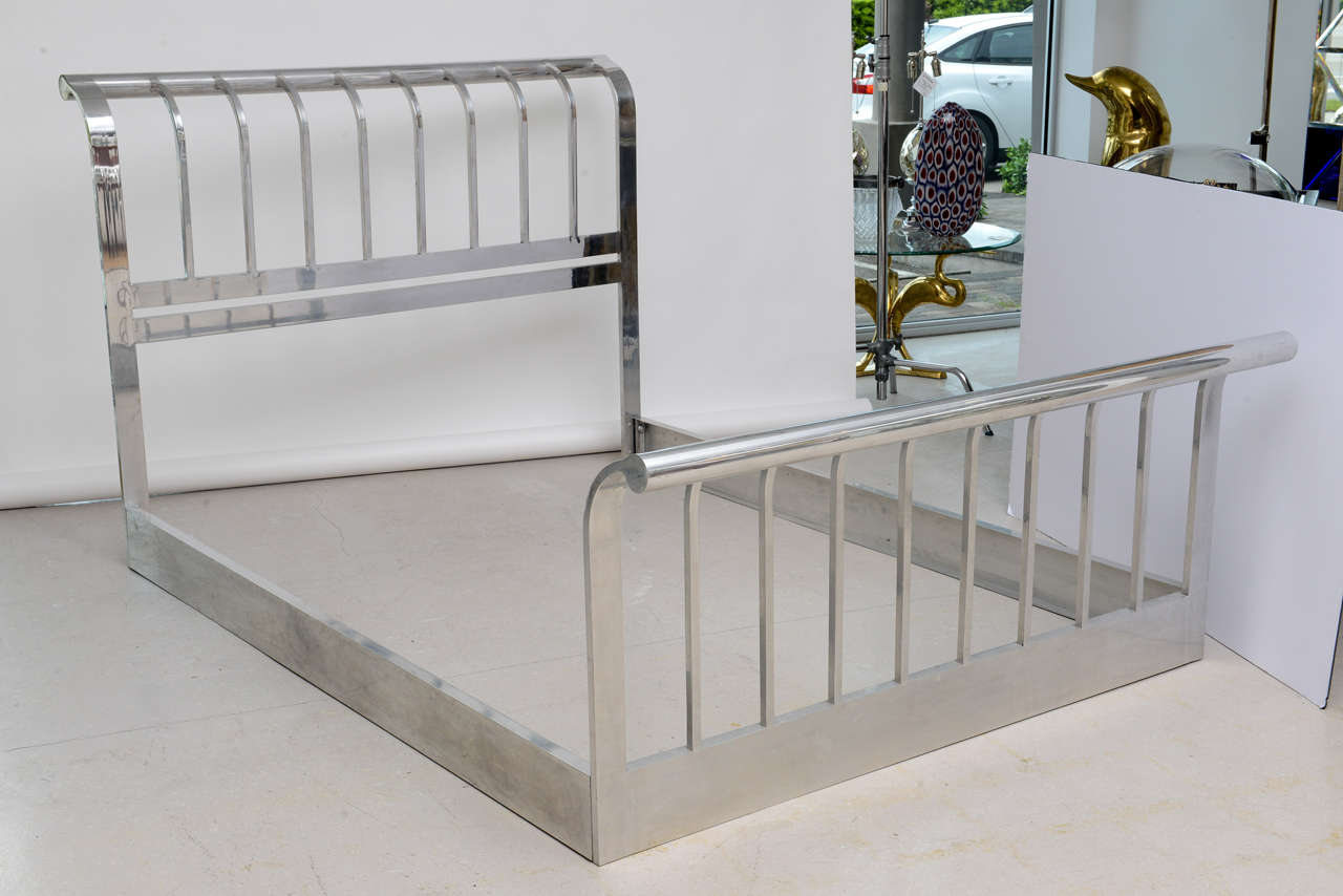 Retro aluminum bed  consisting of a headboard and footboard and coordinating bed rails. Headboard height: 48