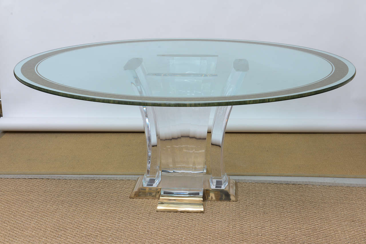 Jeffrey Bigelow Lucite dining table with circular glass top.