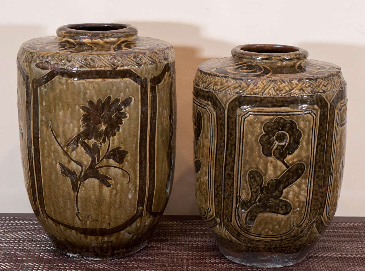 Large antique ceramic food jars with beautifully rendered bird and floral imagery. From China, Hebei Province, circa 1900.<br />
CR430