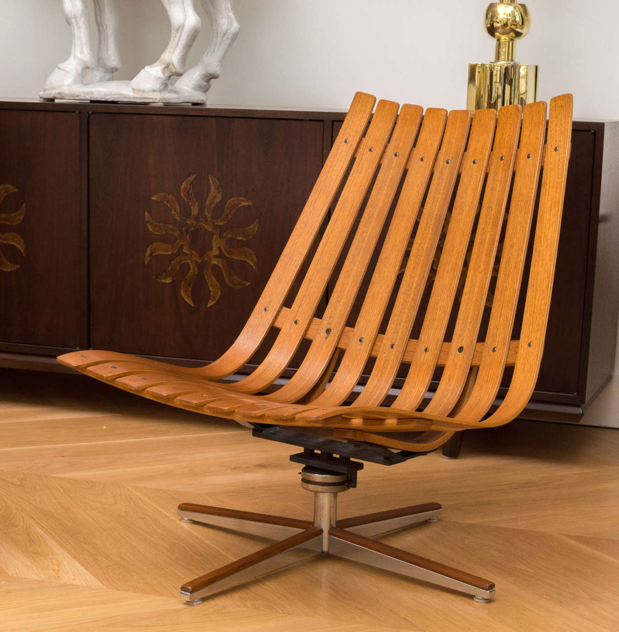 Teak swivel lounge chair by Norwegian designer Hans Brattrud. Produced circa 1960s by Hove Möbler. I still have the leather cushions.