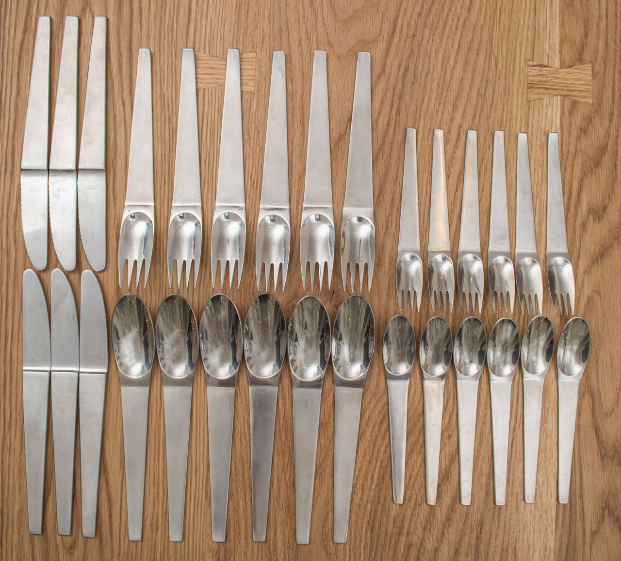 Carl Aubock stainless flatware set for six, designed in 1957.
Manufactured by Amboss, Austria pattern #2060.