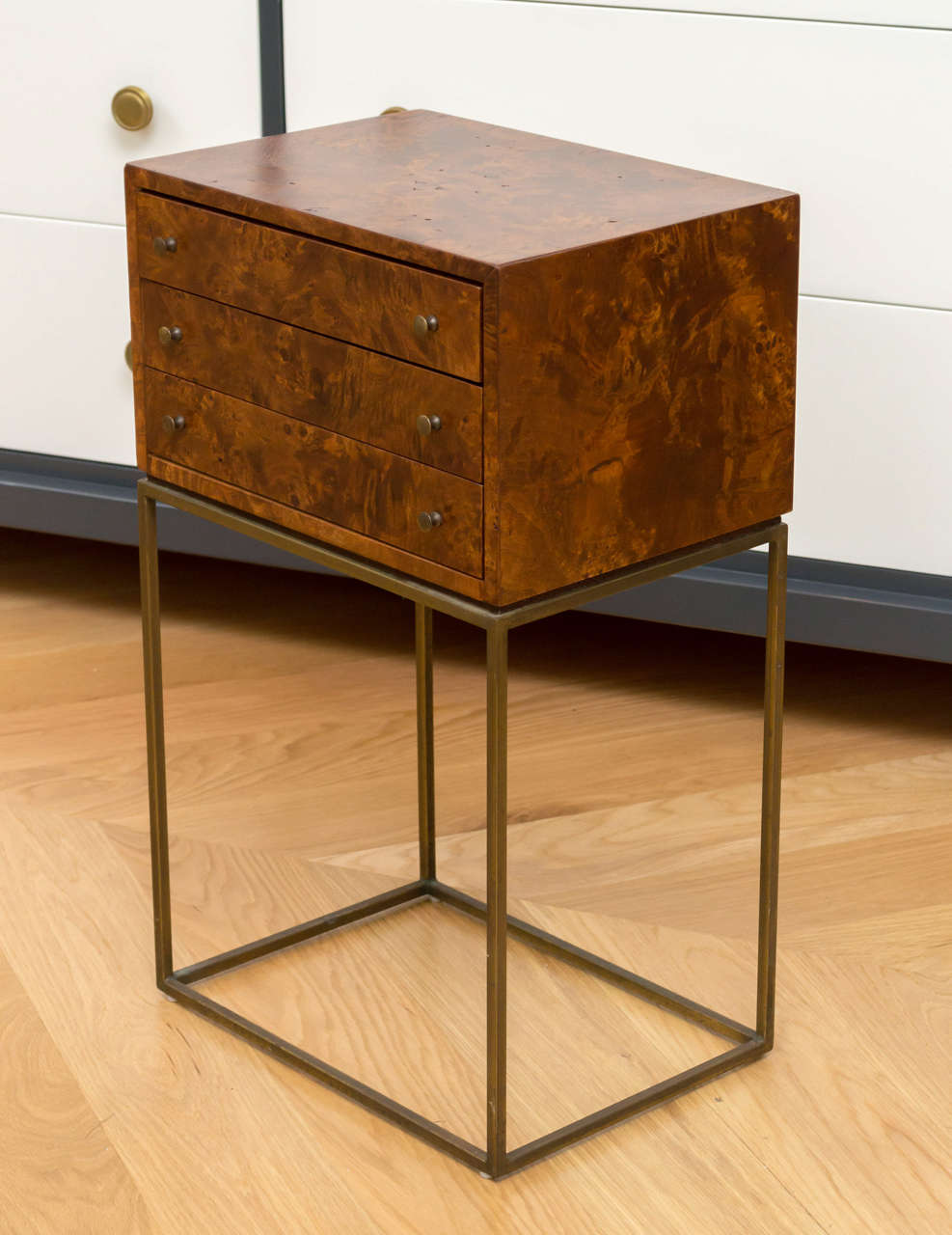 Petite Milo Baughman jewelry chest, with a book matched burl and patinated bronze base.