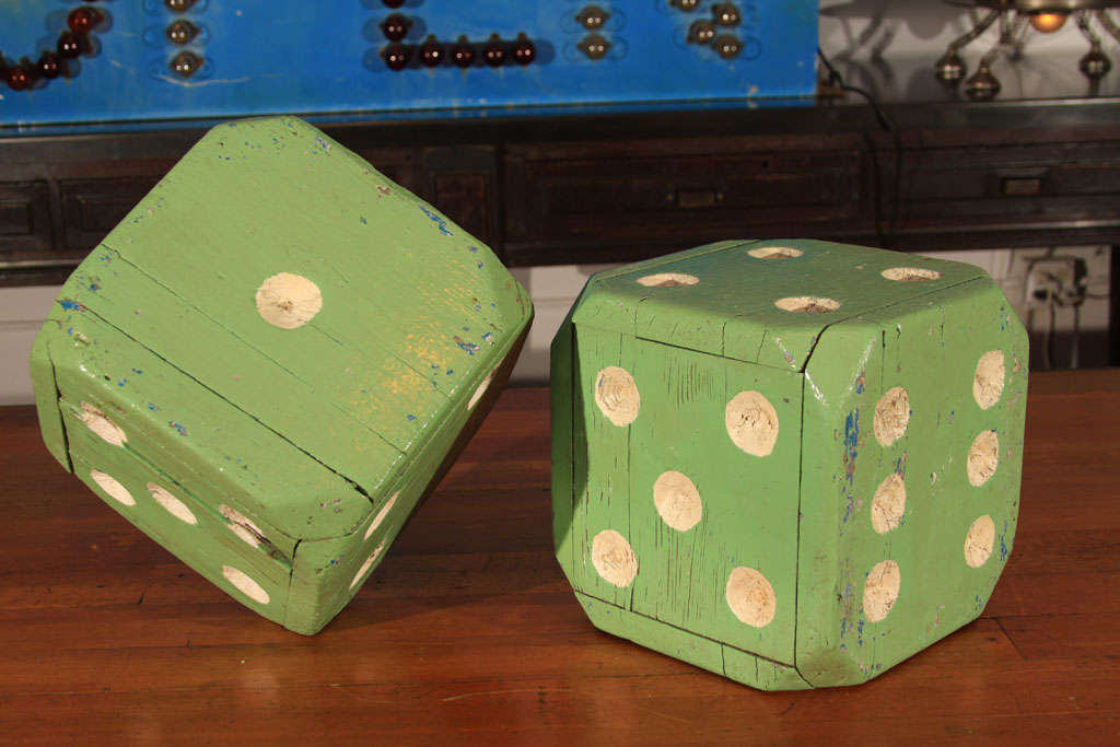 An amazing green paint with hints of French blue cover these handcrafted wood dice, perhaps once used for casino display.  Loaded with charm and character.