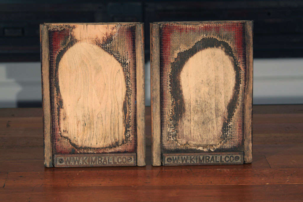 Constructed of wood with remnants of decorative wool carpet, this pair of well worn pedals proudly display the memory/foot print of the organist.