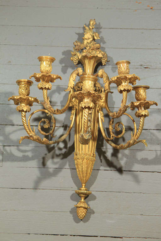EXCELLENT QUALITY 5 ARM SCONCES WITH  SCROLLS AND FRUIT AND FLOWER BASKET ATOP, ACORN FINIALS AT BOTTOM, SATYR MASKS, STAMPED WITH THE INITIALS  V.R AND THE NUMBERS 977