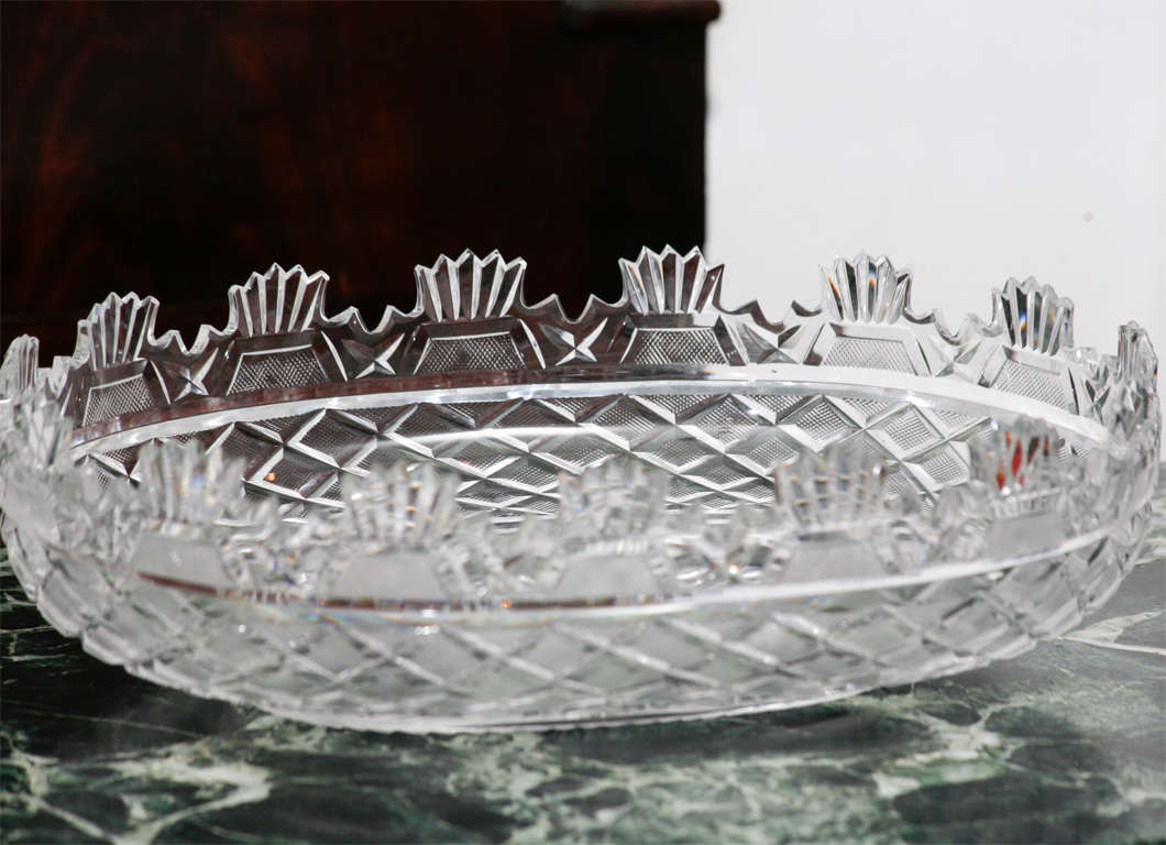 A finely cut and polished crystal regency style Waterford Louise Kennedy bowl . The Regency shape is a time-honored style for good English cut crystal and has many historical precedents. The cutting is especially fine and deep with the pattern being