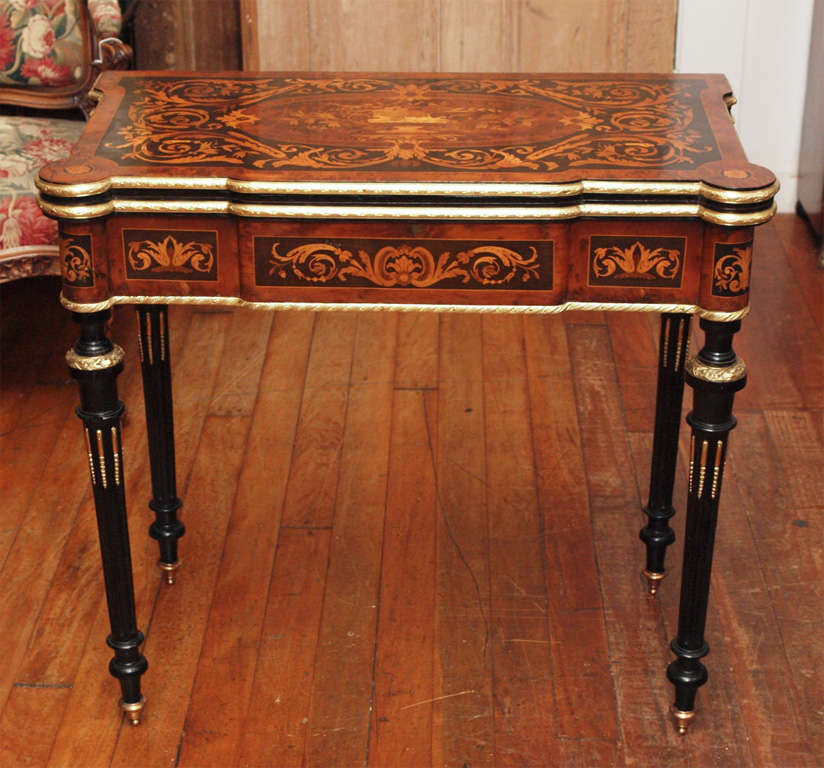 Briarwood inlaid with ebony and satinwood and other exotic woods. Ormolu mounted. Epitome of workmanship of the Belle Epoque period.