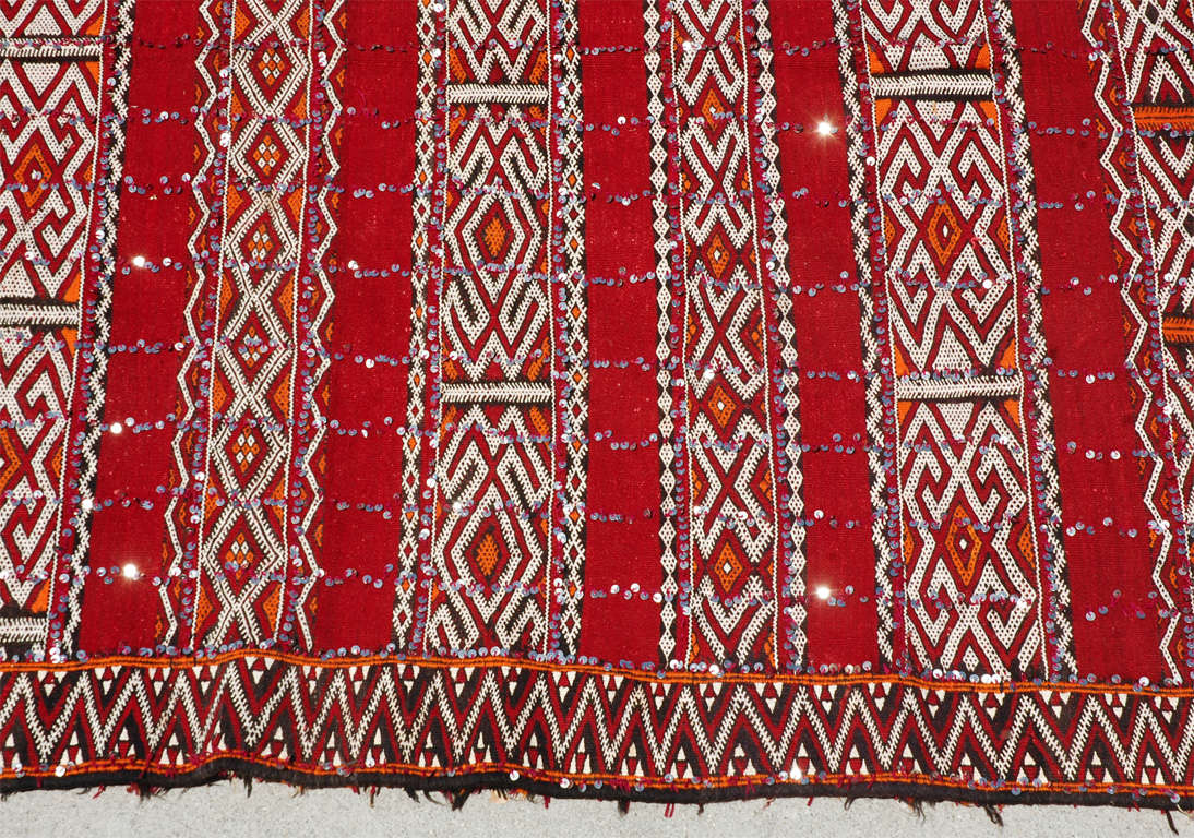 Moroccan Tribal Wedding Rug With Sequins. Moroccan vintage tribal rug flat woven by the Zaiane Berber women from Morocco.Moroccan summer rugs are light flat Kilim, easy to carry around the house or to the beach .Very nice Moroccan rug, hand woven by