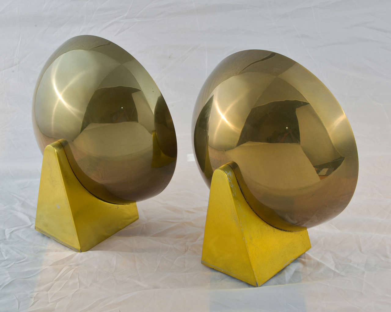 Nice polished brass bowls and anodized bases.

KURT VERSEN sconces, pair

Kurt Versen Co., originally designed USA, c. 1935

12.5 w x 13 d x 5.5 h inches

PRICED AS A PAIR.
Signed with molded manufacturer's mark to reverse.