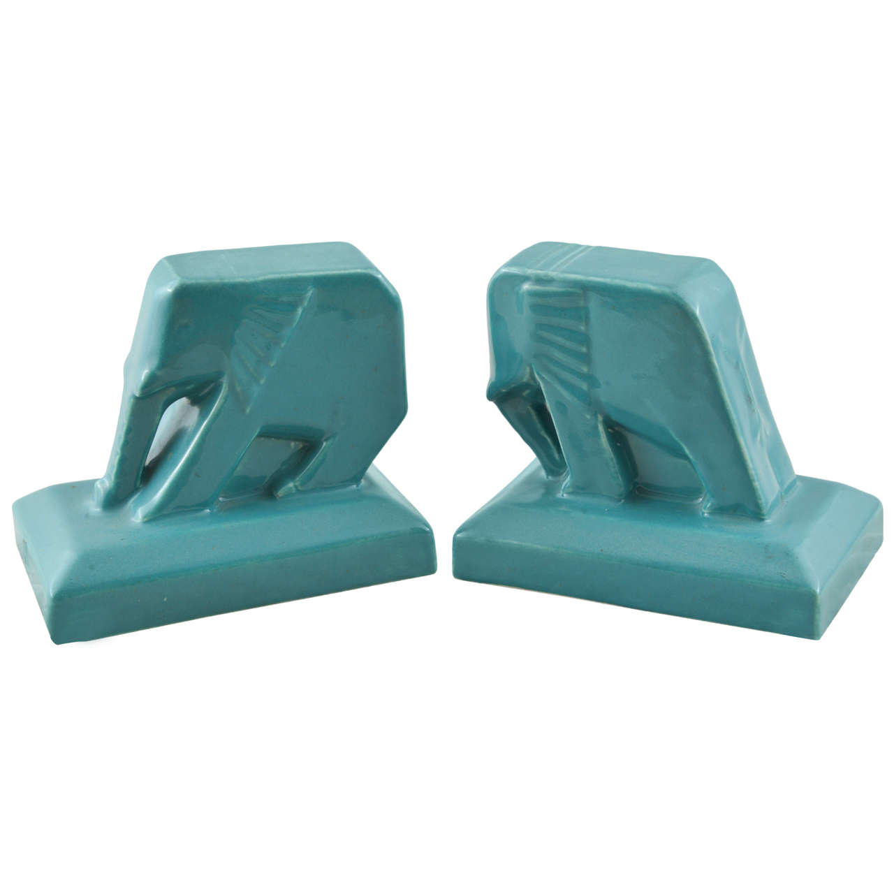Pull Bookends Cowan Push-Pull Elephant bookends by M. Postgate at 1stDibs