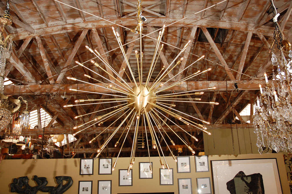 5 FT DIAM. LARGE 72 LIGHTS BRASS SATIN FINISH ON STEEL SPUTNIK CHANDELIER.