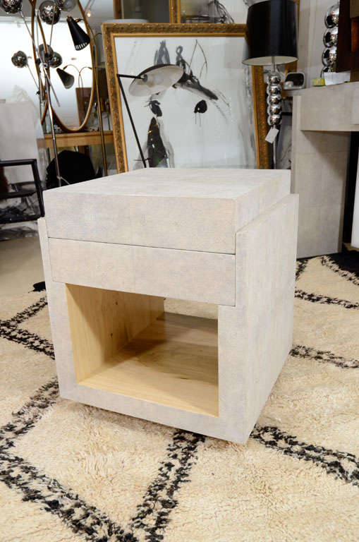 Pair of cream shagreen side tables, nightstands with two drawers. They also come in brown, black or khaki shagreen colors. The shelves have light colored palm wood which can also be made of medium dark palm wood.
Production time is 15-16 weeks,