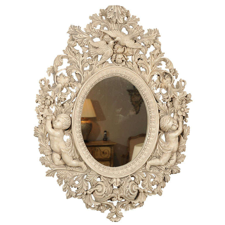Elaborately carved mirror For Sale