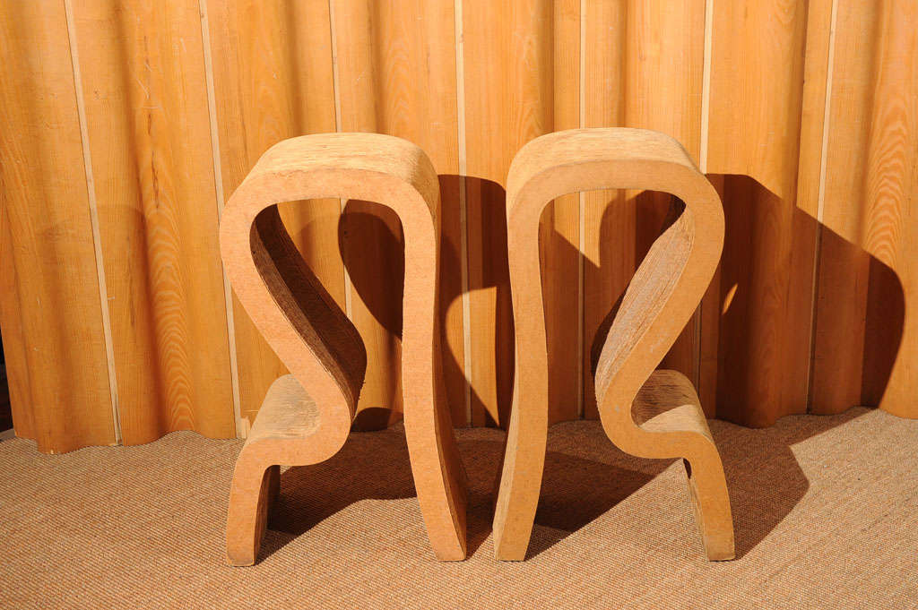 Original pair of Frank Gehry design bar stools in very good vintage condition.