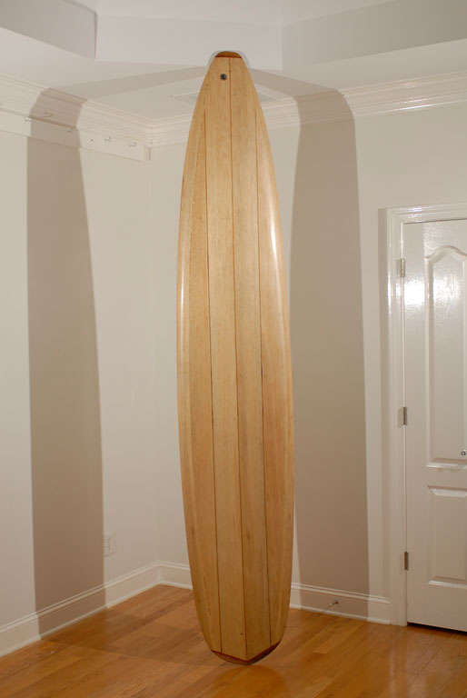 Lightweight balsawood surfboard made by Andres Kozminski in Playas, Ecuador