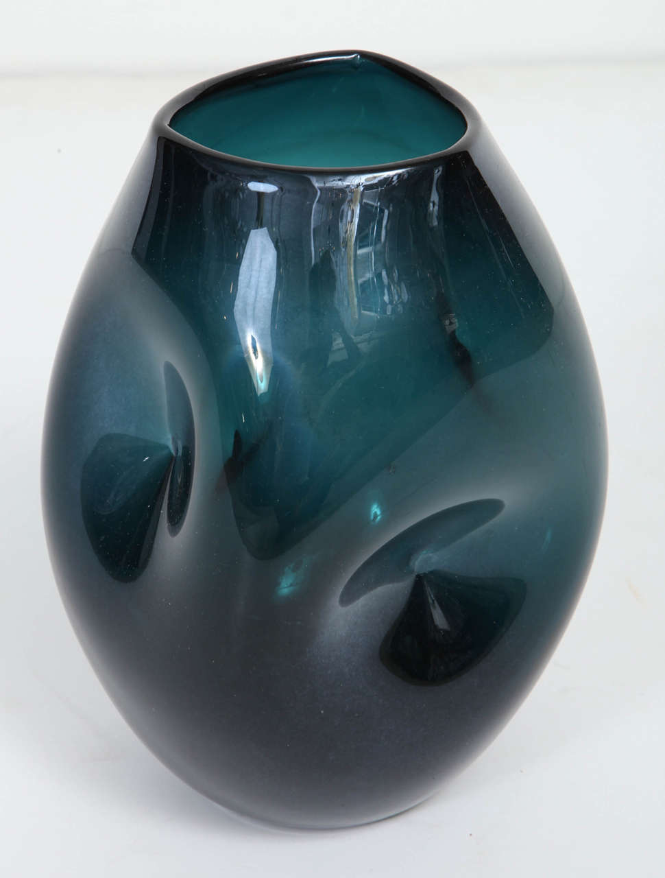 Sculptural jade green smoke glass vase with dimpled surface.  Empoli,  Italy, circa 1960.