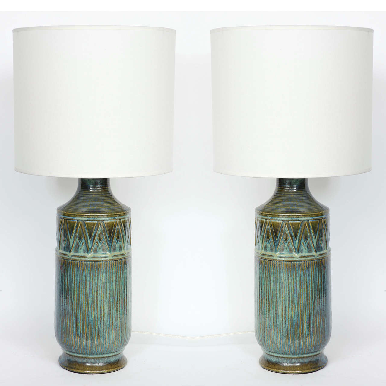 Pair of Danich Modern Mottled blue/green glazed ceramic lamps with a graphic pattern border.