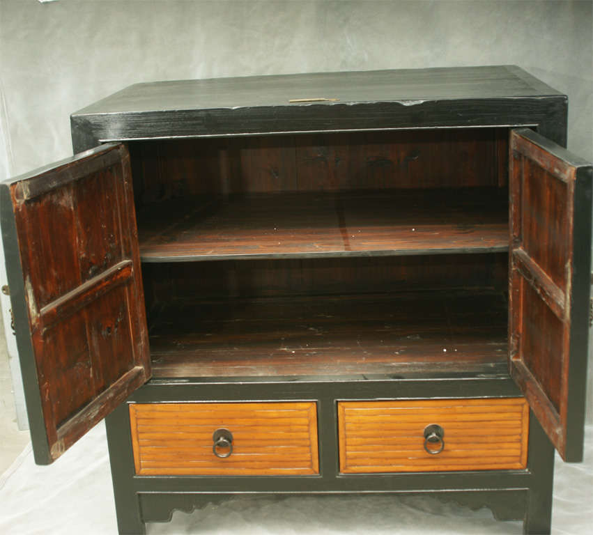 Late 19th century Qing dynasty two-door and two-drawer kitchen storage cabinet.
