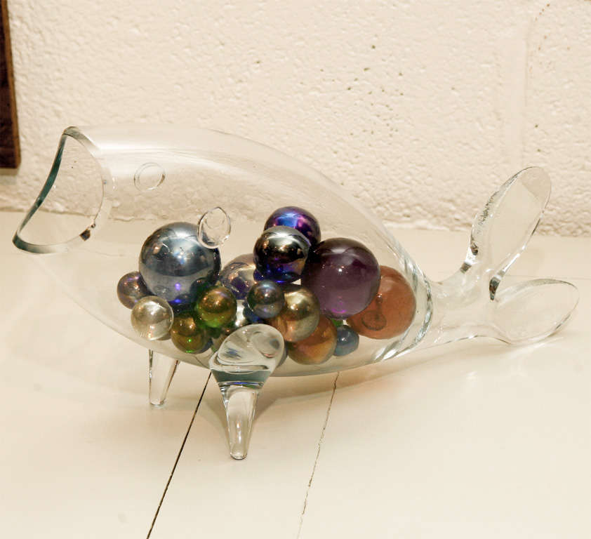 This great hand blown glass fish is made by Blenko.<br />
The iridescent glass balls look like bubbles. Fun.