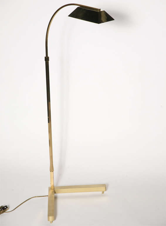 Floor lamp with polished brass pharmacy fixture and stem.  Brushed brass 